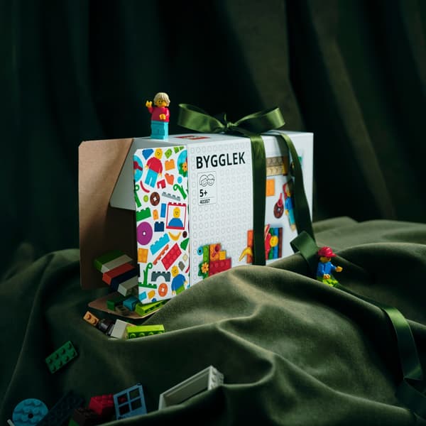 box of lego toys in gift wrapping