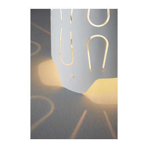 KAJUTA Table lamp IKEA Creates a decorative light pattern in the room when the light shines through the perforated shade.