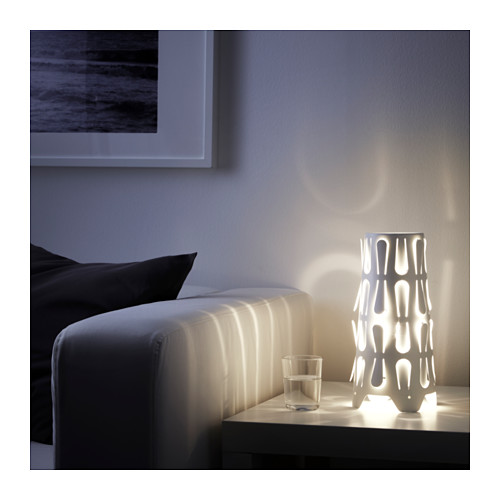 KAJUTA Table lamp IKEA Creates a decorative light pattern in the room when the light shines through the perforated shade.
