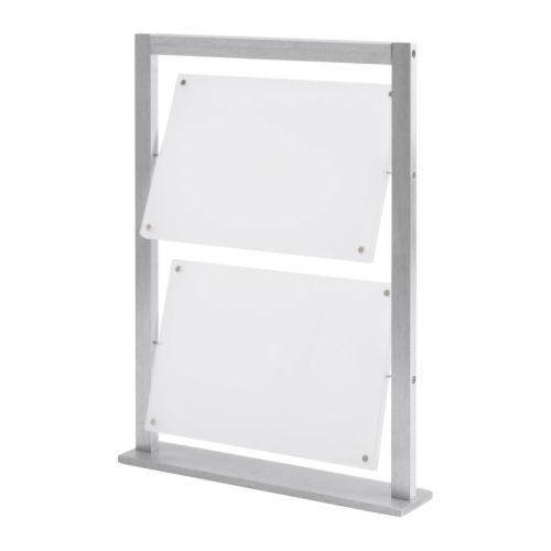 FINLIR Ramme for 4 bilder IKEA Holdes sammen med magneter; enkelt å bytte motiv.  Transparent; 2 motiv kan settes i hver bildeholder. 