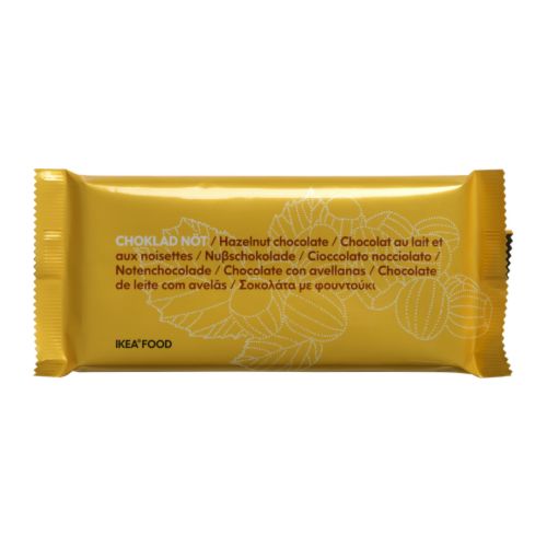 CHOKLAD NÖT Tablete de chocolate c/avelãs IKEA Chocolate de leite delicadamente suave, rico e cremoso, com pedaços de avelã.   Conteúdo de cacau: 26%. 