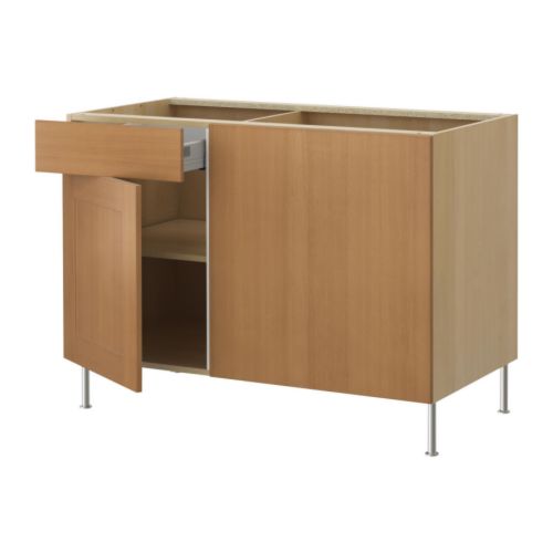 AKURUM Corner base cabinet with shelf IKEA Adjustable shelf; adapt spacing to your own storage needs. 