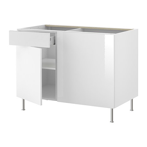 AKURUM Corner base cabinet with shelf IKEA Adjustable shelf; adapt spacing to your own storage needs. 