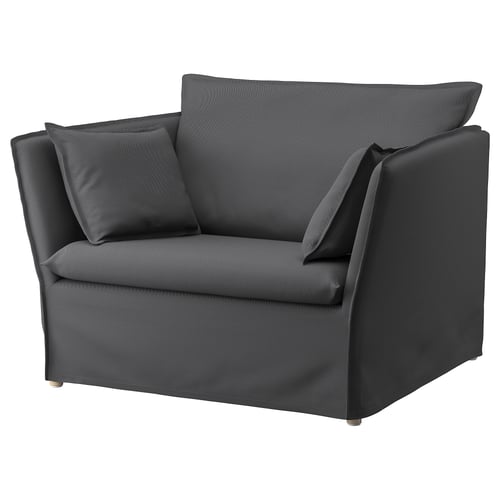 Dark grey chic armchair with sleek design. Comfortable for seating, modern aesthetic.