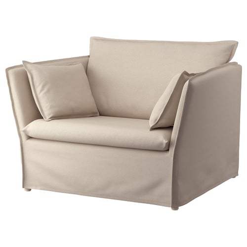An off-white, rectangular armchair with padded cushions. It has a modern design with clean lines and removable, machine-washable fabric.