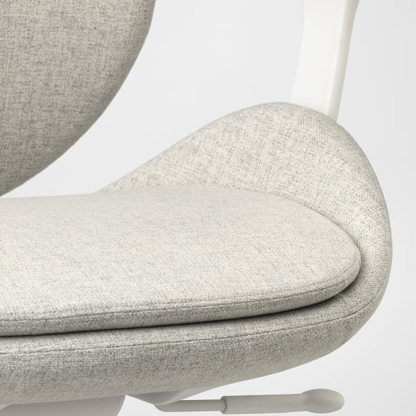 Modern office chair close-up, featuring plush, ergonomic seat and sleek white armrest, promising comfort and style.