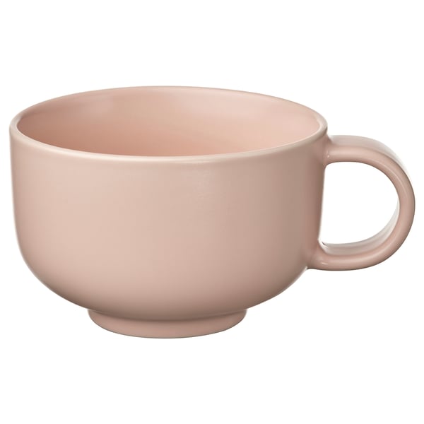 A single, light pink, round mug with a handle, known as the BLOMVECKLARE.