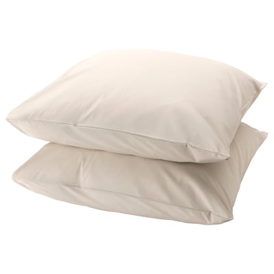 Two square beige pillows, stacked, smooth fabric, simple design.