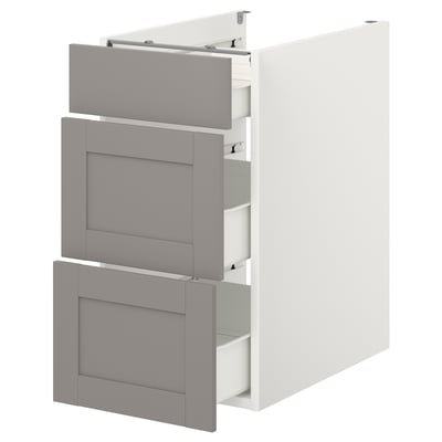 ENHET white kitchen cabinet with 3 grey drawers. Modern, large, 3-drawer design for extensive storage.