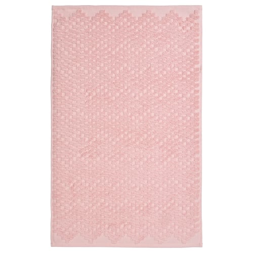FJÄLLKATTFOT pale pink bath mat, rectangular, soft cotton terry with textured pattern.