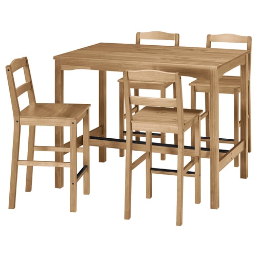 Natural wood rectangular dining table and four chairs, light brown finish. Simplistic design with sturdy, sprawling legs.