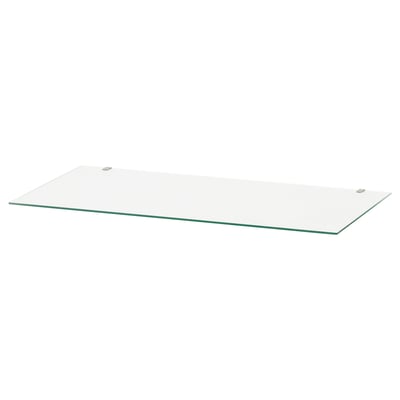 A clear glass shelf, ideal for HEMNES furniture, providing protection and a clean look.