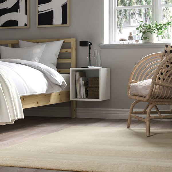 Low pile rug named LANDSVÄG in off white, soft & durable, stripe pattern, fits large spaces, looks great anywhere.