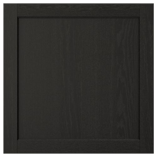 Dark wood cabinet door with bevelled edges.