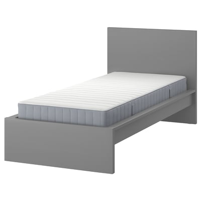 Displays a grey MALM bed with a sleek, modern design and a high headboard, positioned against a white background.
