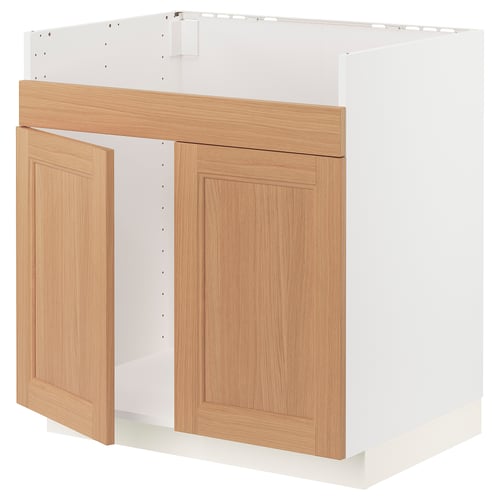 Wooden kitchen unit, oak doors, white frame, modern.