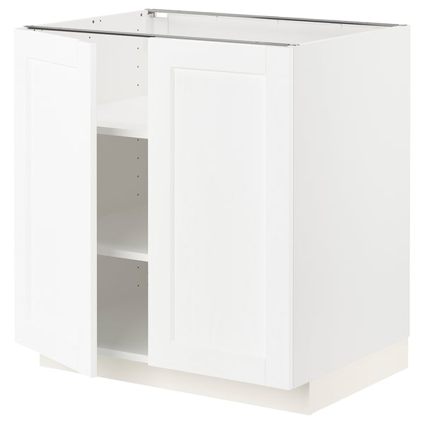 White METOD kitchen cabinet with adjustable shelves.