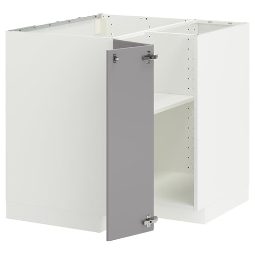 METOD white corner kitchen cabinet with grey door, featuring adjustable shelves and sturdy frame.