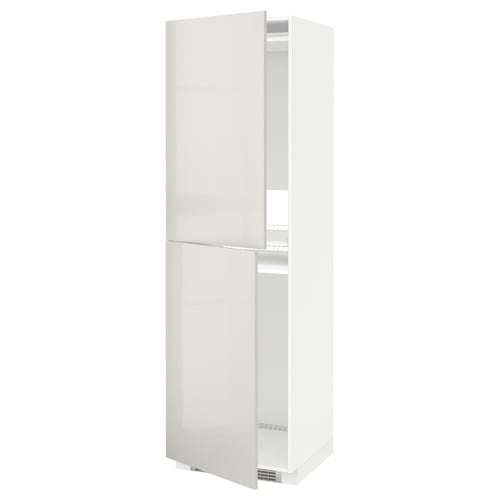 A white METOD kitchen cabinet with a glossy finish and two doors. It a sleek, modern design with adjustable shelves.