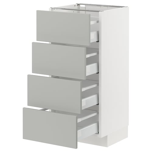 White METOD storage unit with four grey drawers.