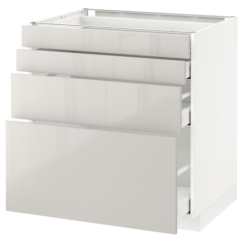 White METOD kitchen unit with multiple drawers.