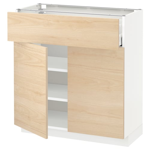 METOD kitchen unit with light ash drawers and white base, featuring adjustable shelves and smooth-close drawers.