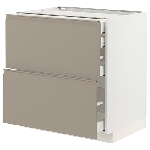Modern kitchen unit with drawers in grey-beige.