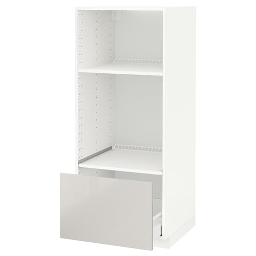 White METOD kitchen cabinet, glossy finish, open drawer, adjustable shelf.
