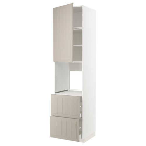 A white METOD kitchen cabinet with beige stensund fronts. It includes a tall unit with a cabinet and drawers.