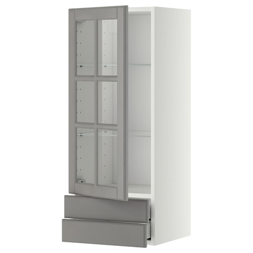 Modern white cabinet, grey-tinted glass doors, sleek handles, tall & rectangular, adjustable shelves.