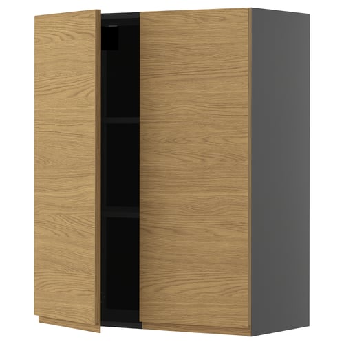 Minimalist METOD kitchen cabinet with oak-effect voxtorp fronts and integrated handles, featuring natural wooden interior shelf.