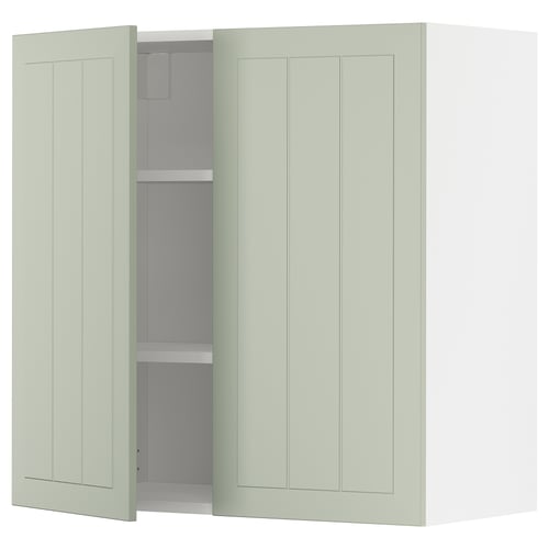 Green METOD kitchen unit with adjustable shelf, light wood grain design.
