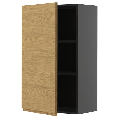 A modern kitchen cabinet with a light wood finish and sleek black sides. It has a rectangular shape and minimalist design with integrated handles.