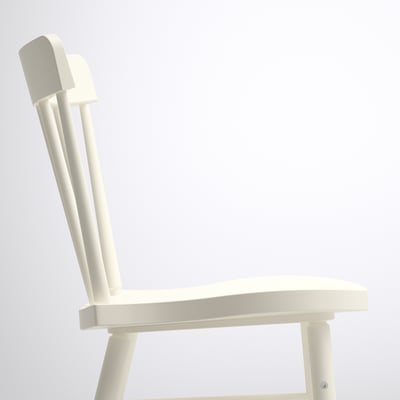 White wooden chair, NORRARYD model. Rounded seats and back, spindle design for comfort.