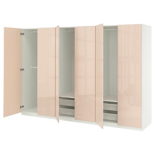This image shows a white ikea PAX wardrobe with four open peach doors, featuring shelves and organizer trays.