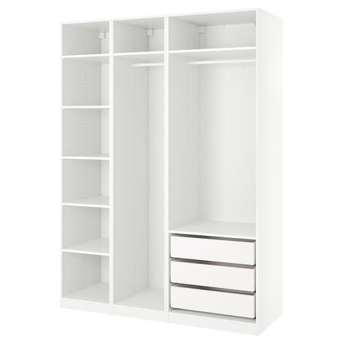 An ikea PAX wardrobe in white with a modular design featuring shelves and drawers.
