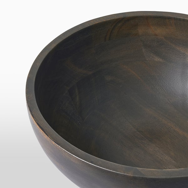 Rustic wooden bowl crafted from acacia. Natural wood grain and smooth finish, ideal for serving and decoration.