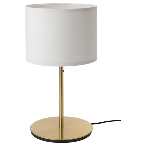 A modern lamp named RINGSTA with a gold base and white shade. It has a sleek, minimalist design.
