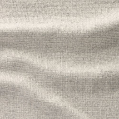 Textured beige fabric, likely part of a sofa cover, showcasing subtle weaving details.