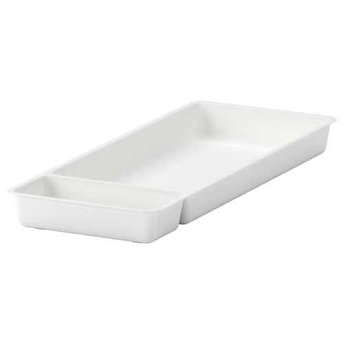 A white STÖDJA drawer organiser. Its made of polypropylene plastic and has a rectangular shape with two compartments.