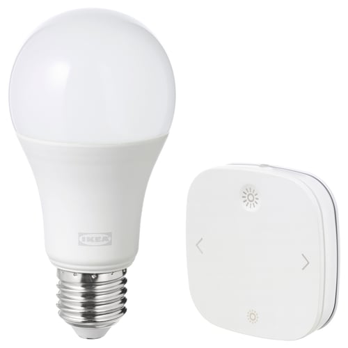 TRÅDFRI smart bulb & remote. White spherical bulb, e26 base. Small white remote. IKEA.