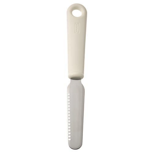 A beige kitchen tool named UPPFYLLD. It has a plastic handle and a stainless steel blade with holes. Used for spreading and decorating.