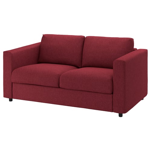 A red VIMLE sofa with a woven texture. It has a sleek, modern shape with removable, machine-washable covers made from cotton, polyester, and viscose.