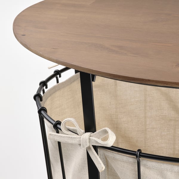 Tischplatte aus Holz mit Metallgestell und Stofftasche.