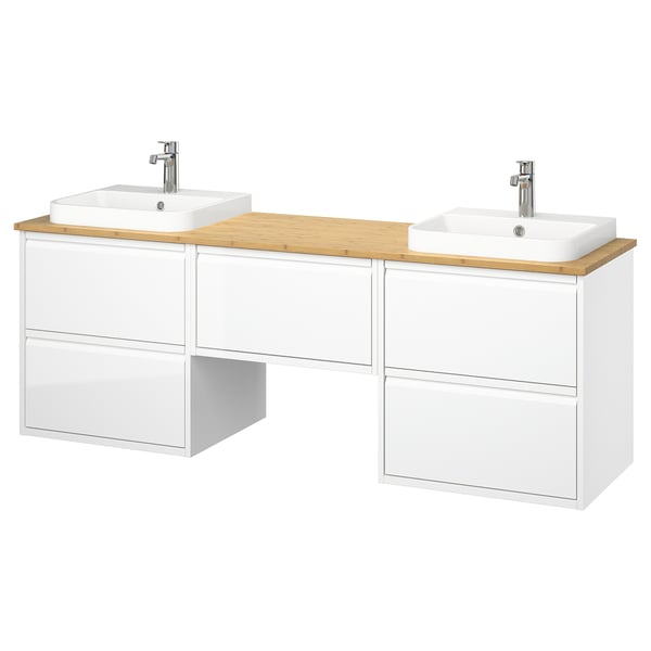 Moderner weißer Waschtisch mit zwei Spülbecken mit Holzplatte, zwei schlanken Schüsseln, wandmontiert, mehreren Schubladen zur Aufbewahrung und offenem Zentrum.