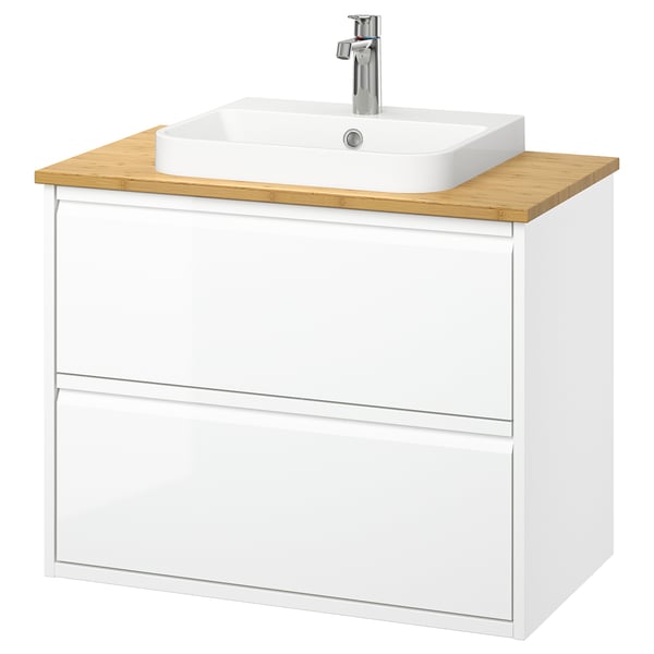 Der Badezimmer-Waschtisch ÄNGSJÖN in Weiß verfügt über eine Arbeitsplatte aus Bambus, ein quadratisches Keramikbecken und zwei Schubladen mit minimalistischem Design zur Aufbewahrung.