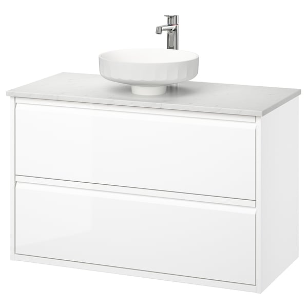 Moderner weißer Wandwaschtisch mit glatter Oberfläche, zwei Schubladen und rundem Marmorwaschbecken.