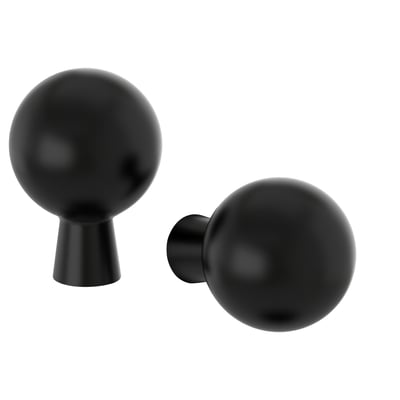 Zwei schwarze, runde BAGGANÄS-Knöpfe; Schlankes, modernes Design. Pulverbeschichteter Stahl, ideal für Schrankgriffe.