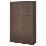 Ikea BESTÅ Regal aus dunklem Holz mit vier verstellbaren Fächern, schlankem und rechteckigem Design.