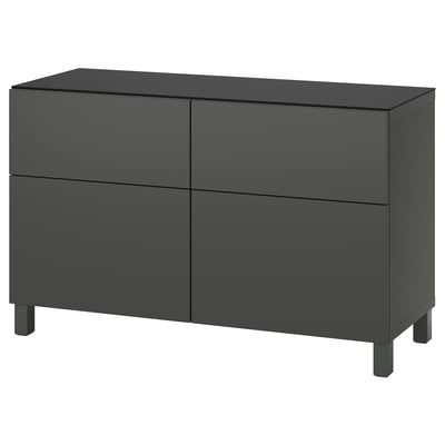 Schwarzer IKEA BESTÅ Aufbewahrungsschrank mit vier Schubladen.